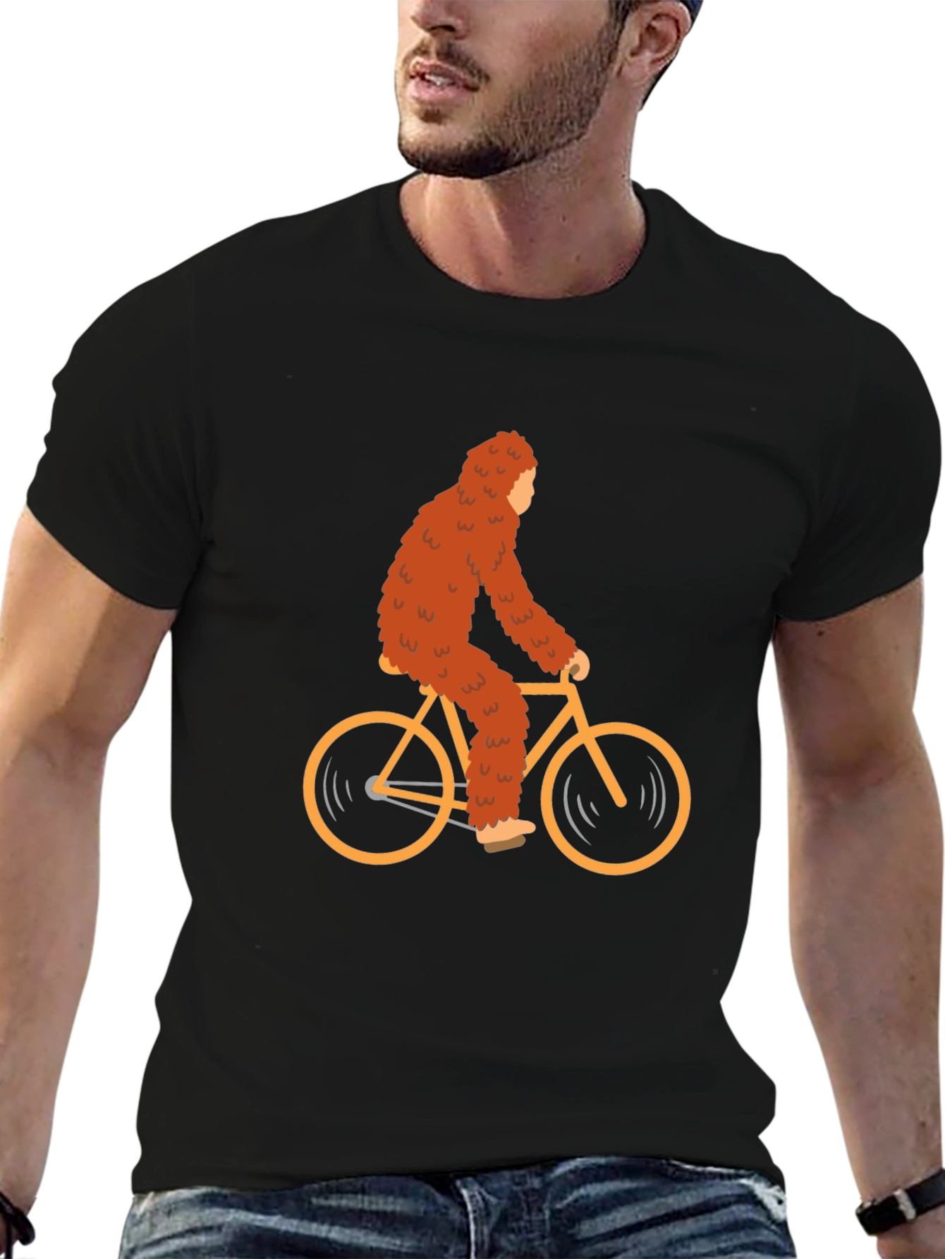 Sasquatch Riding Bike Graphic Tee