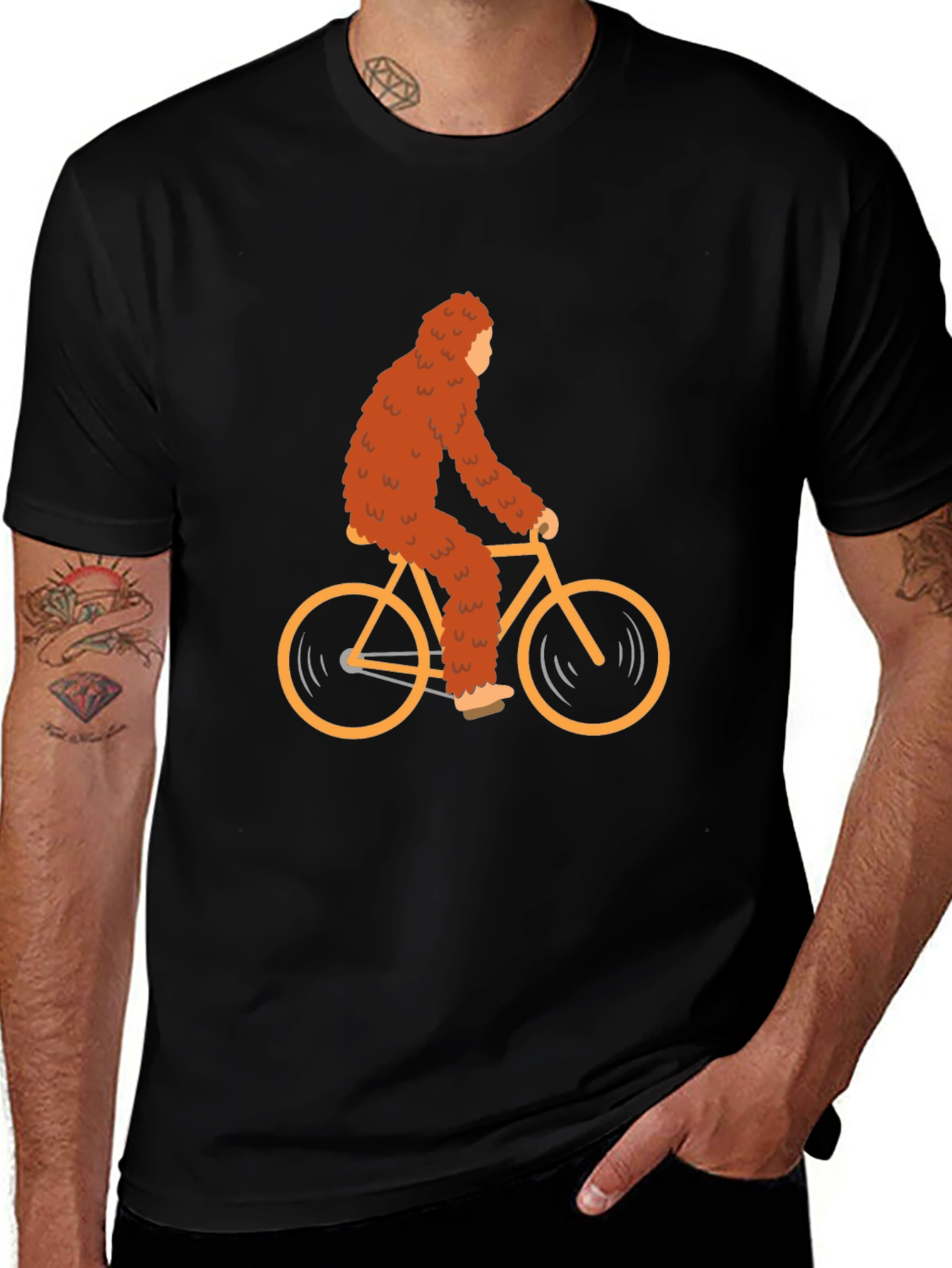 Sasquatch Riding Bike Graphic Tee
